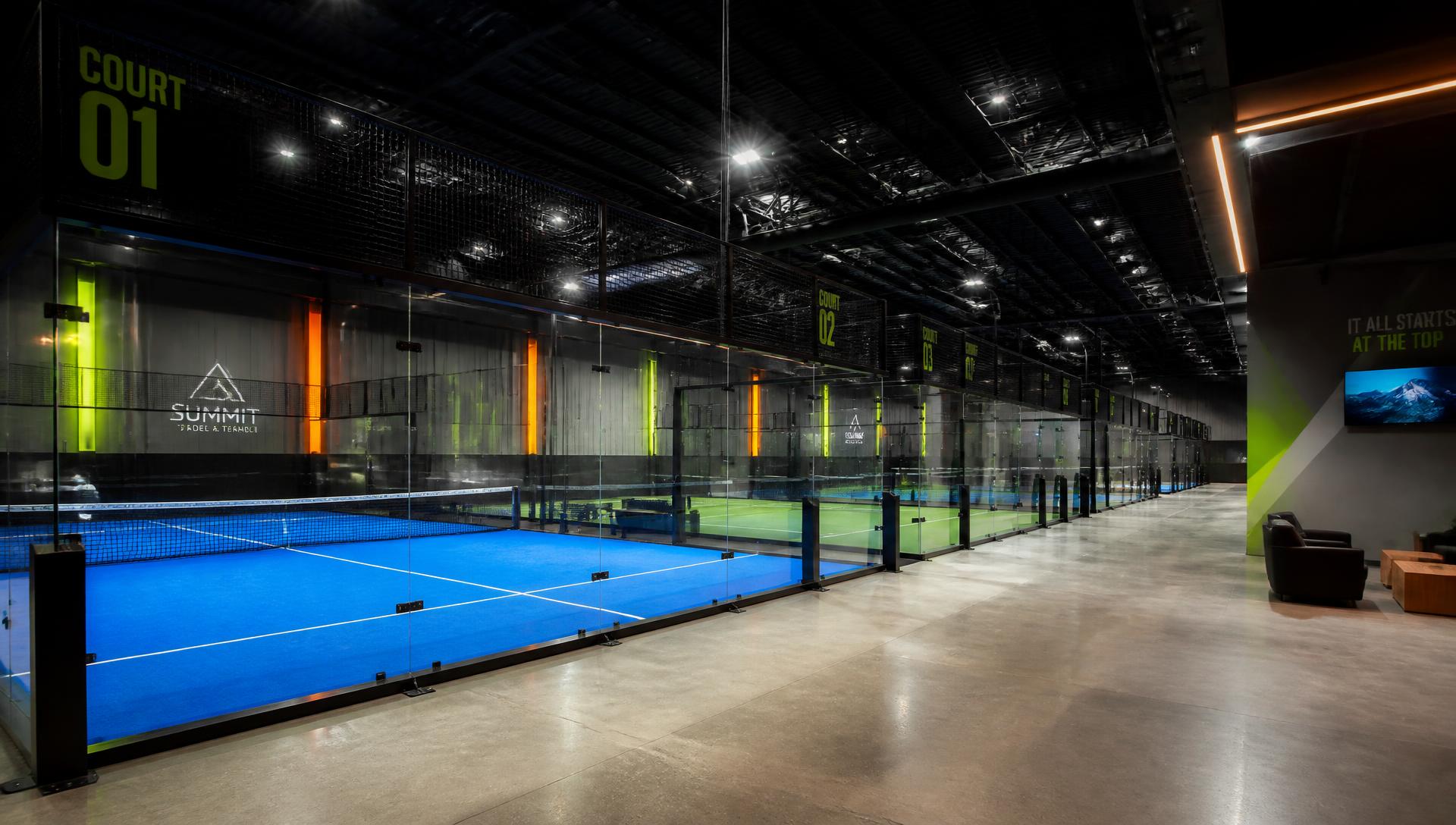 Rendering of the four-court Reset Indoor Racquet Sports facility under high-output LED lighting